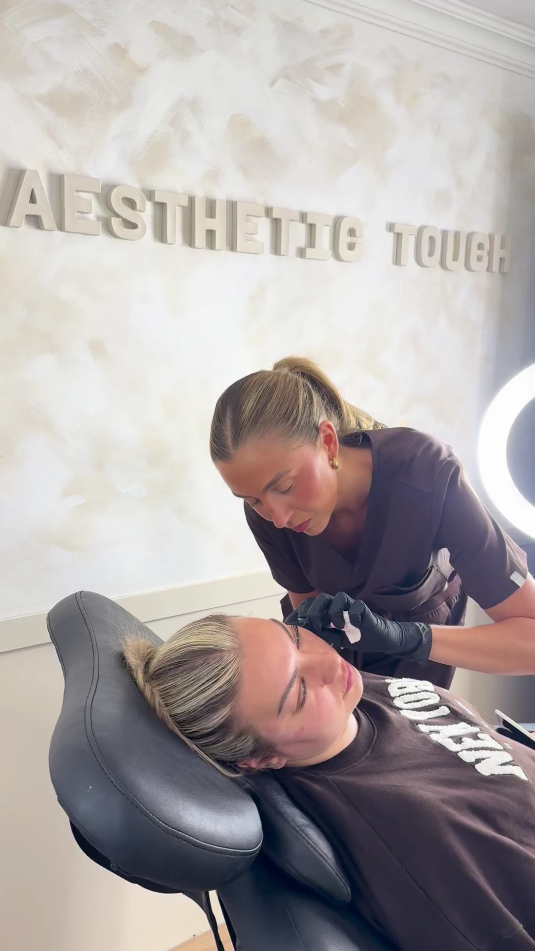 Olivia Crane performing a treatment at the clinic